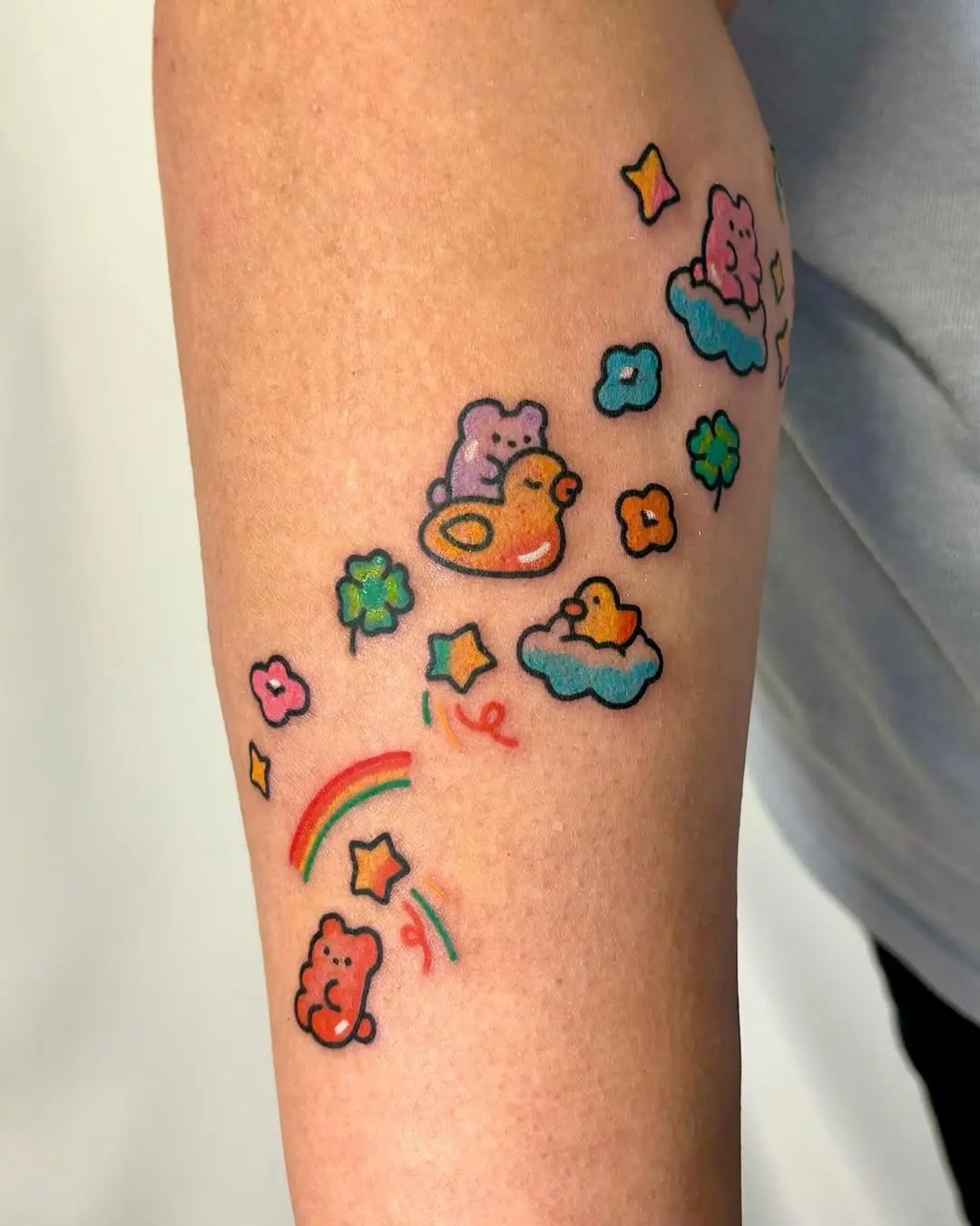 Playful bear tattoo with whimsical elements