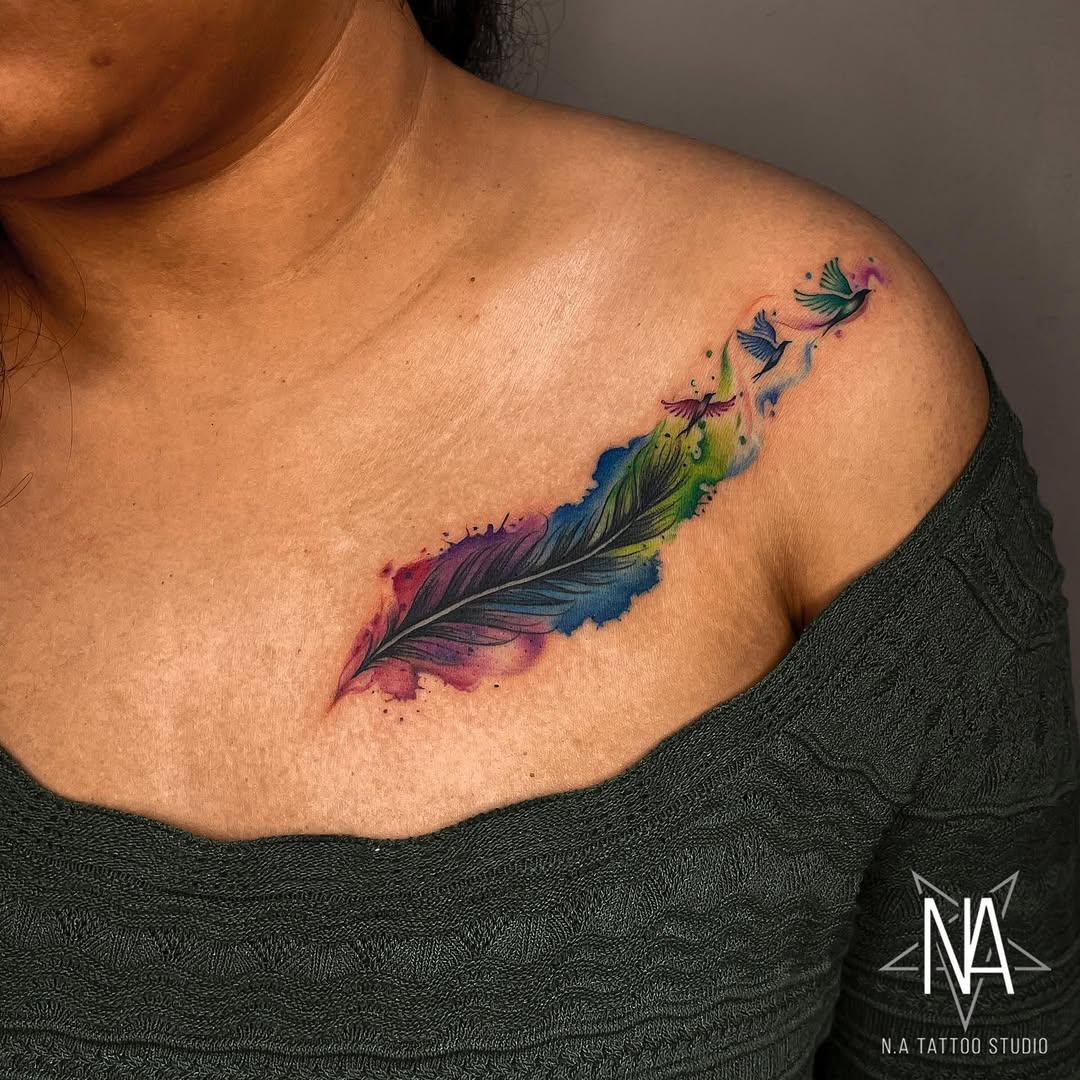 Vibrant Color Splash Feather Tattoo Inspiration