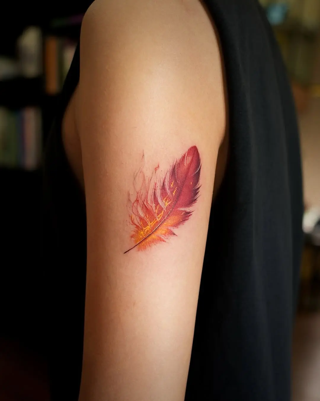 Stunning Vibrant Feather Tattoo Design