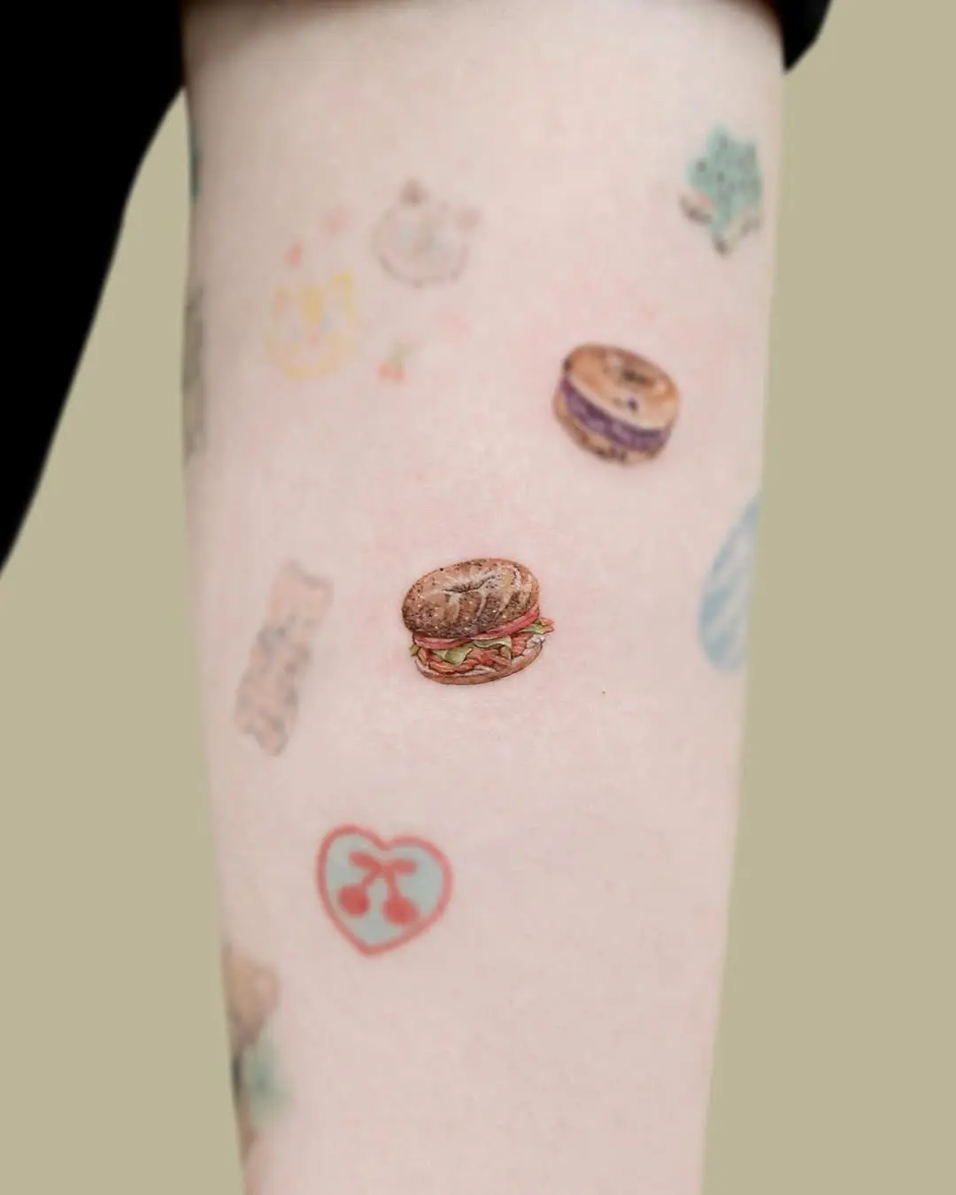 Whimsical edible-themed body art on display