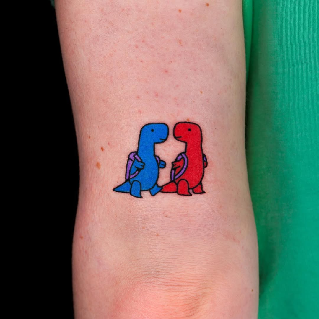 Cute dinosaur tattoo showcasing friendship and fun