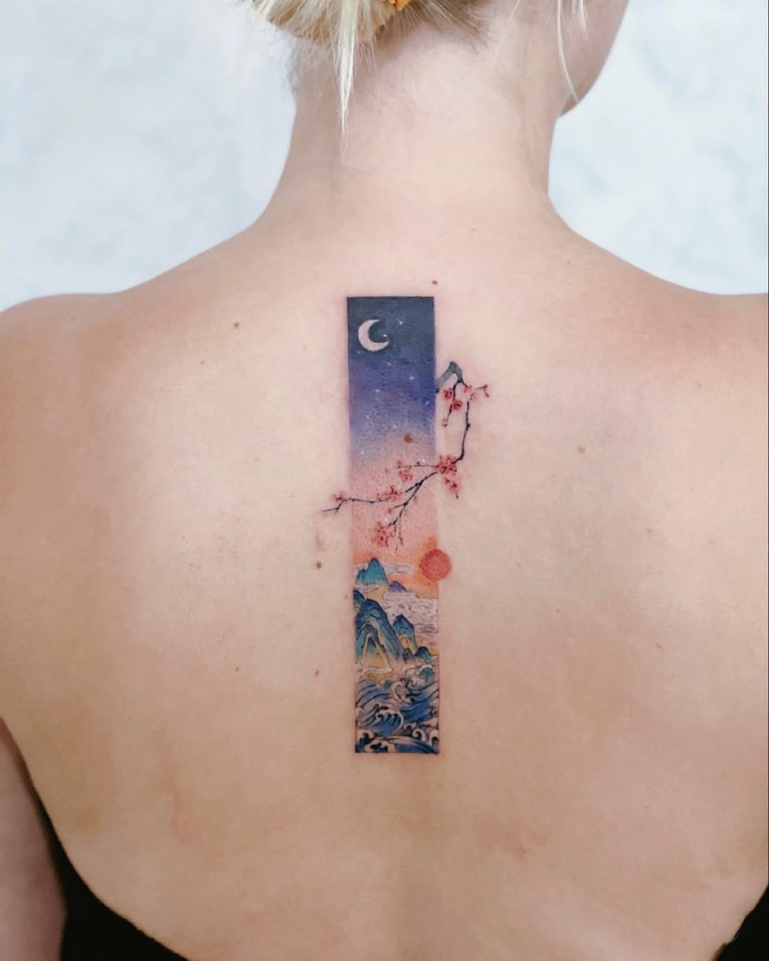 Stunning landscape tattoo with serene elements