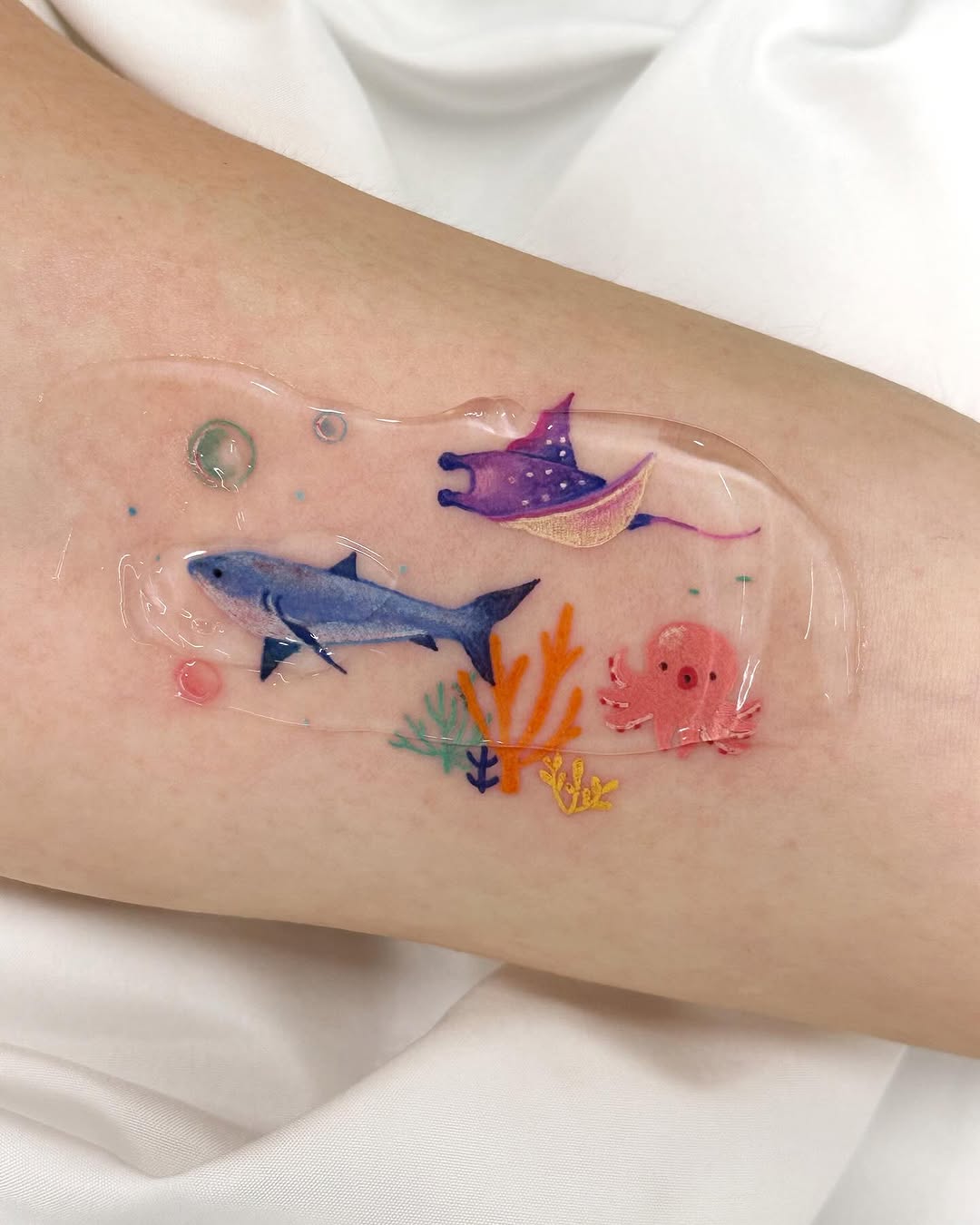 Vibrant Shark and Aquatic Creatures Tattoo