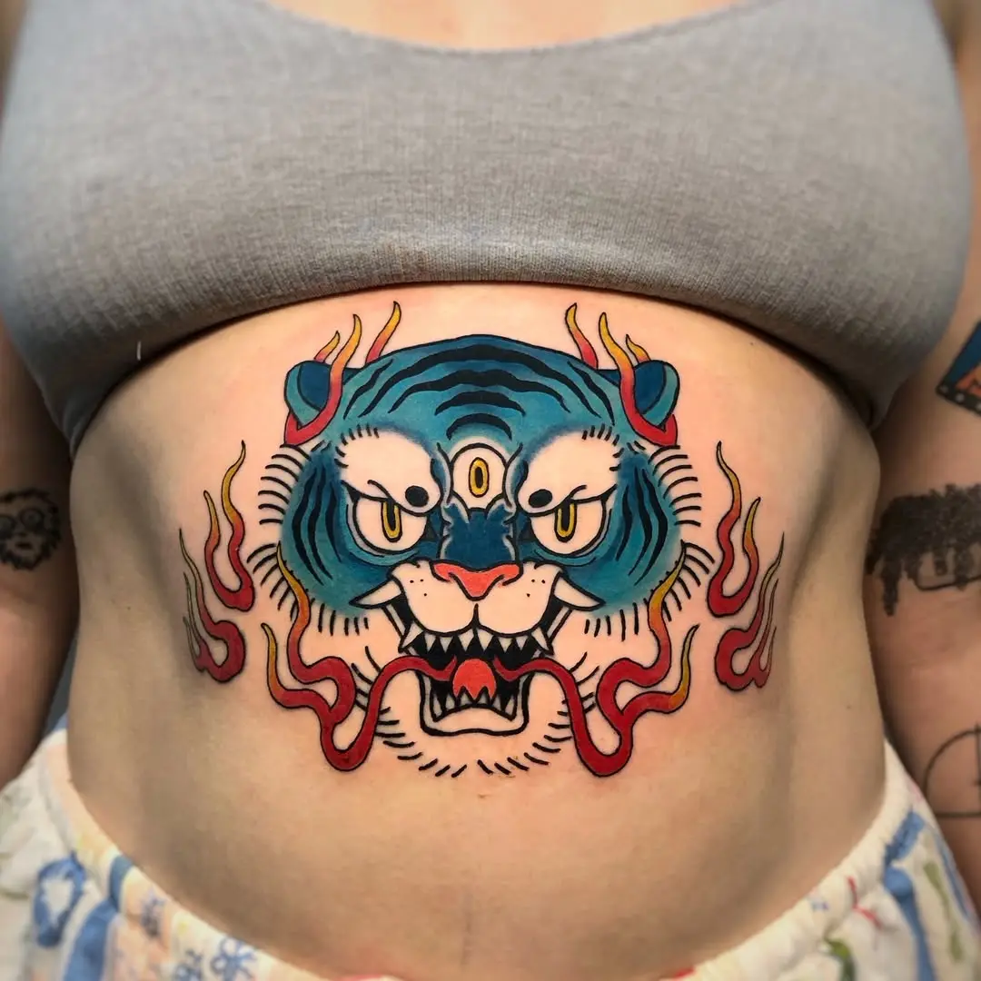 Vibrant tiger tattoo with fierce energy