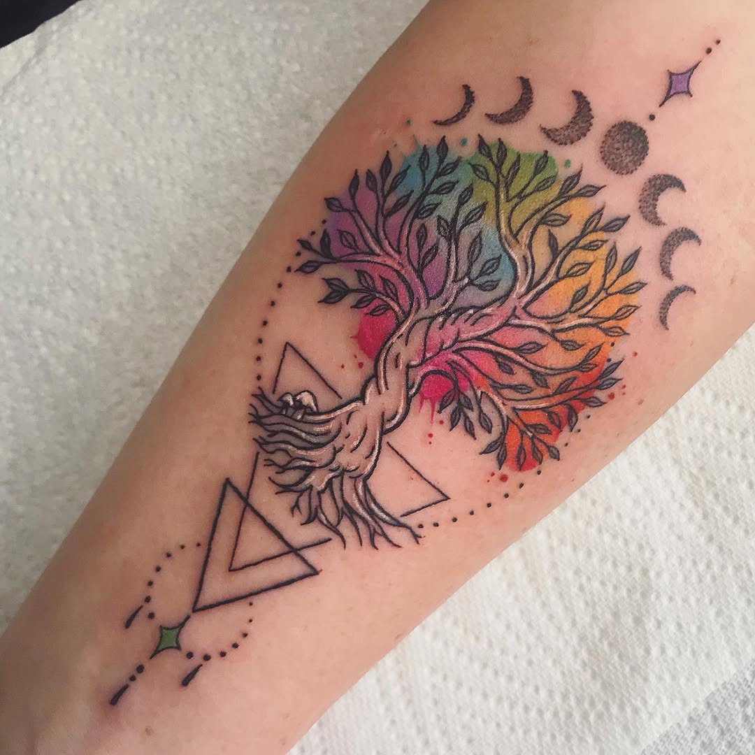 Vibrant tree of life tattoo with cosmic elements