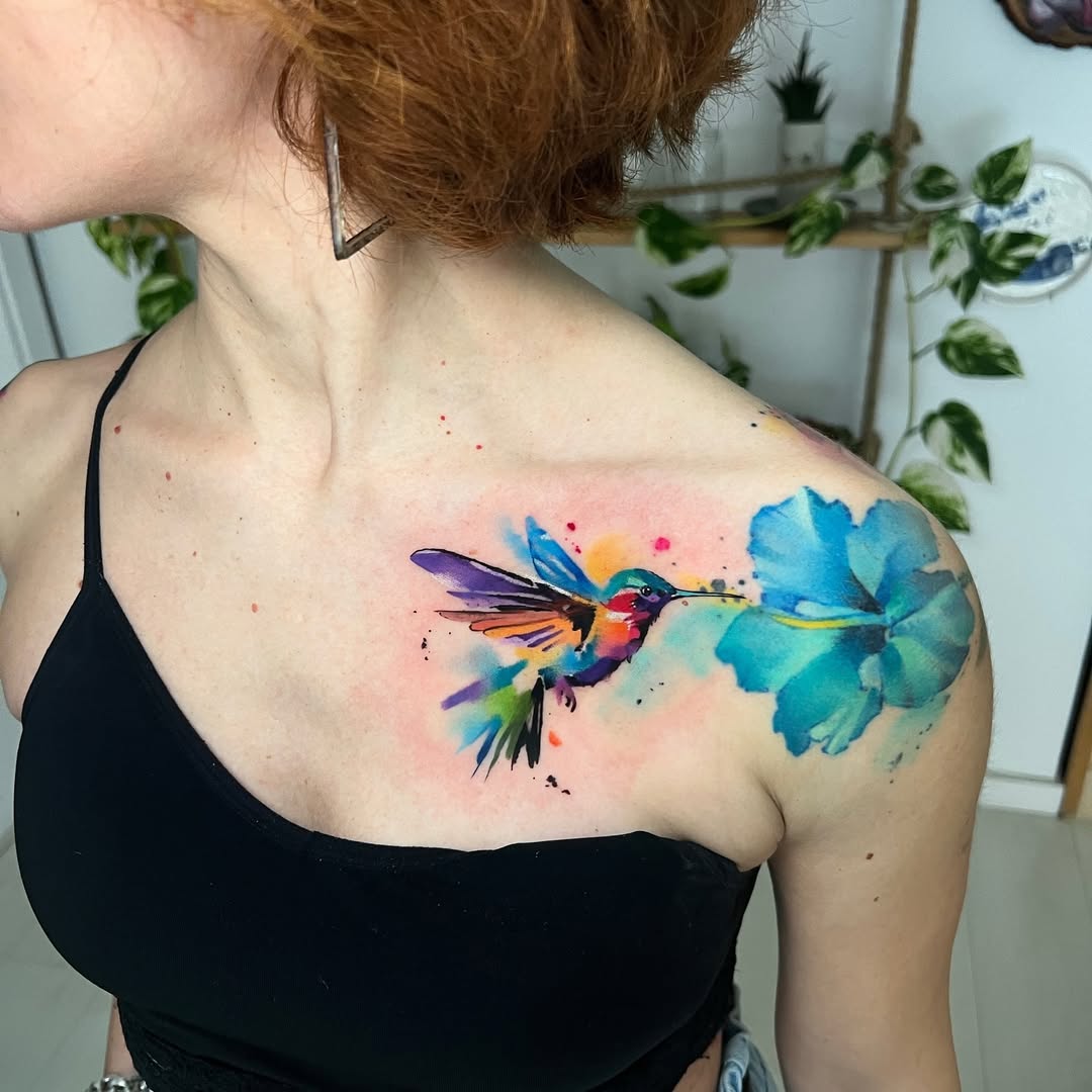 Stunning watercolor hummingbird and flower design
