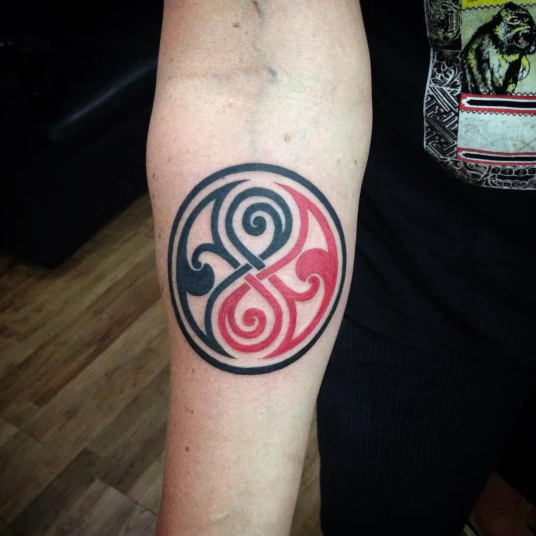 Colorful Yin Yang Tattoo with Intricate Swirls