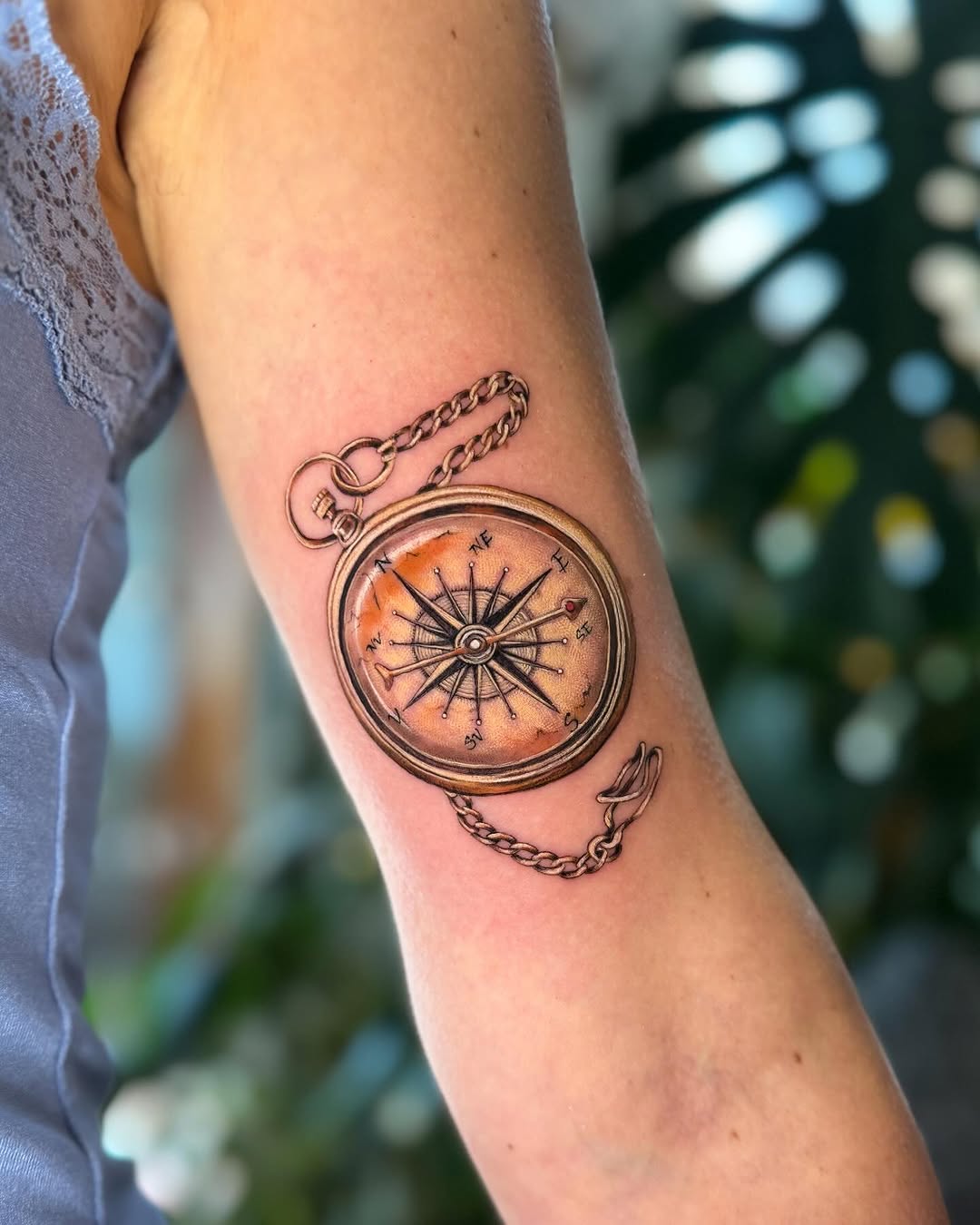 Intricate compass tattoo with a vintage feel