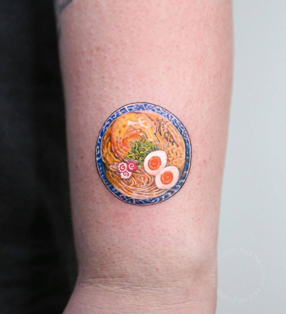 Delicious ramen bowl tattoo on forearm