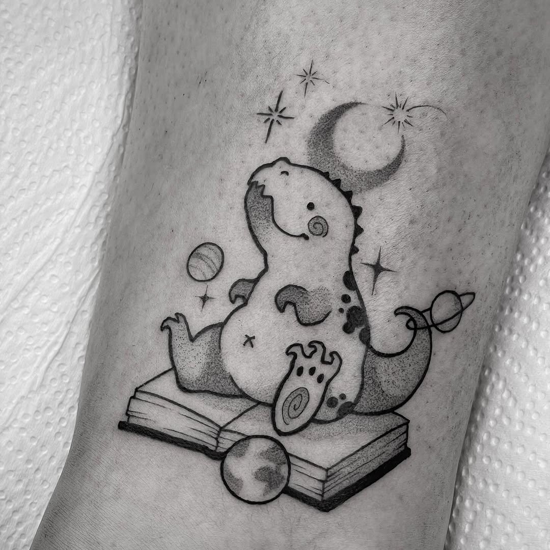 Adorable dinosaur tattoo with starry vibes