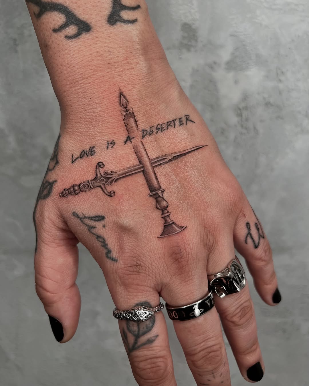 Intricate Dagger Tattoo with Meaningful Text