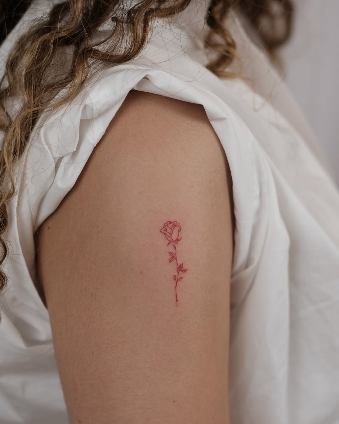 Elegant rose tattoo for a subtle statement