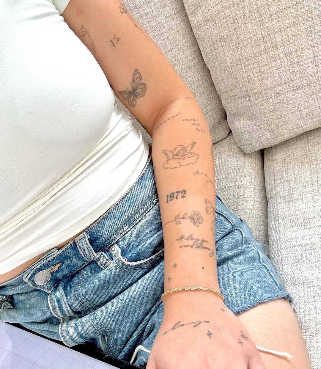 Charming and delicate woman sleeve tattoos revealed