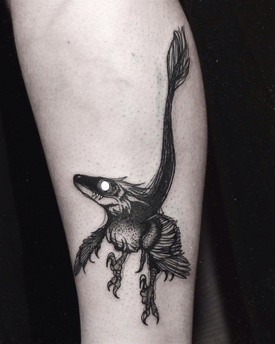 Stylish dinosaur tattoo with artistic flair