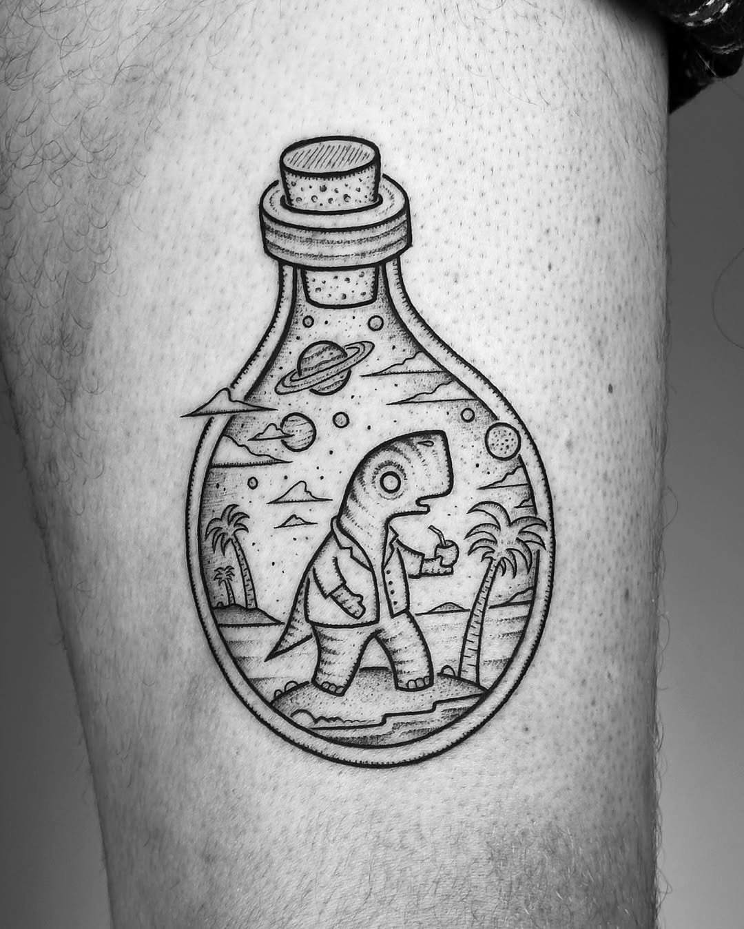 Whimsical dinosaur in a cosmic bottle tattoo