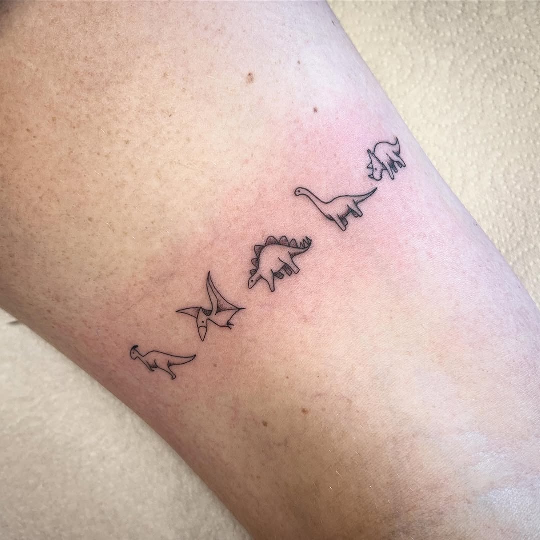 Charming minimalist dinosaur tattoo lineup