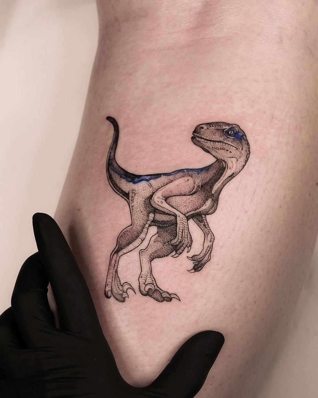 Intricate raptor tattoo showcases stunning artistry