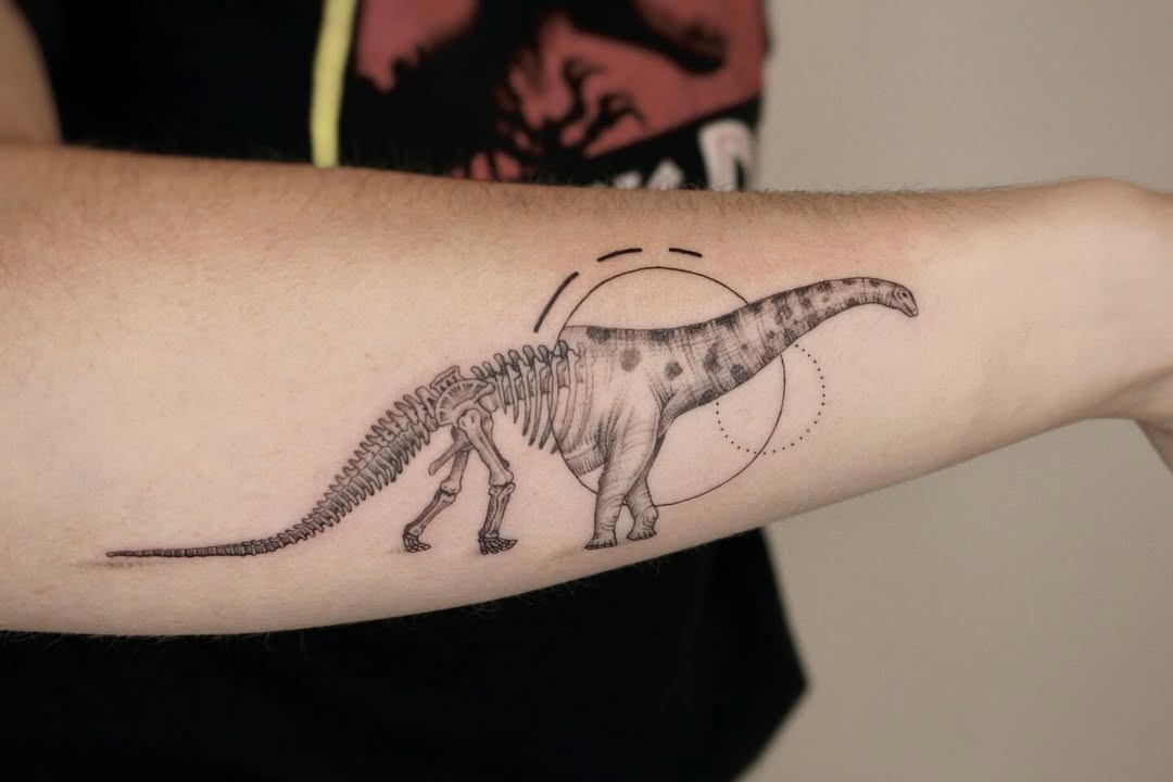 Artistic dinosaur silhouette tattoo with bone details