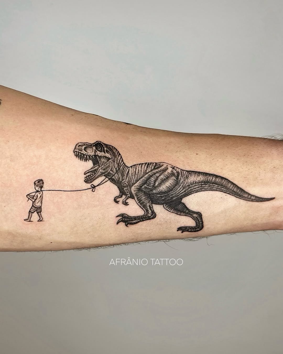 Whimsical T-Rex Tattoo with Child Touch