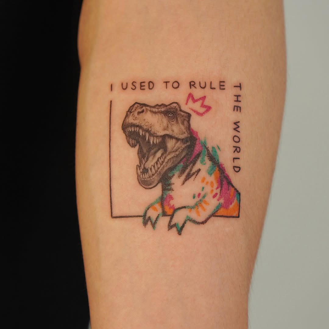 Bold T-Rex Tattoo with Colorful Crown Design