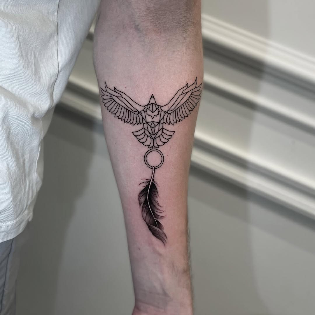 Elegant feather tattoo with bird motif