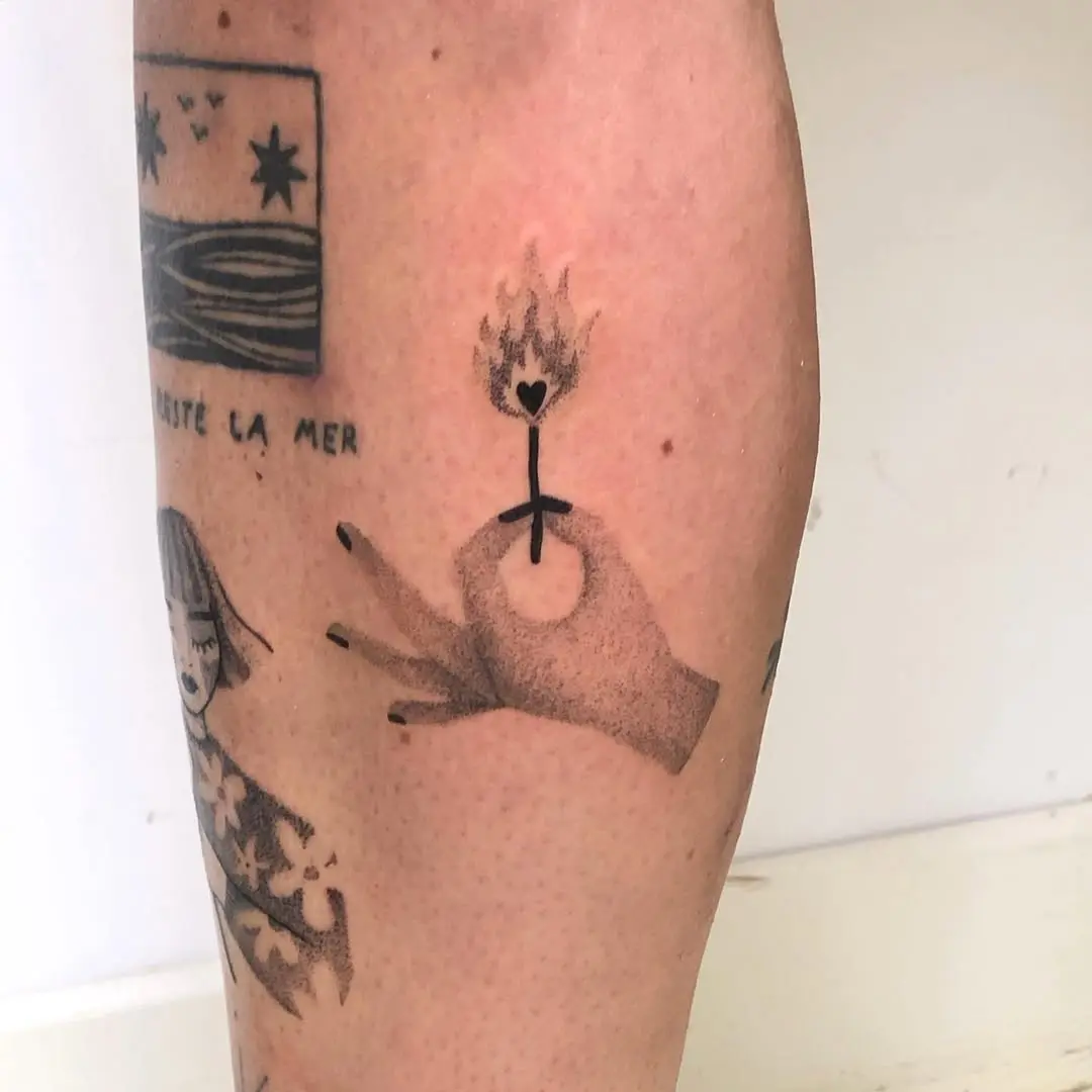 A striking tattoo depicting a fiery heart