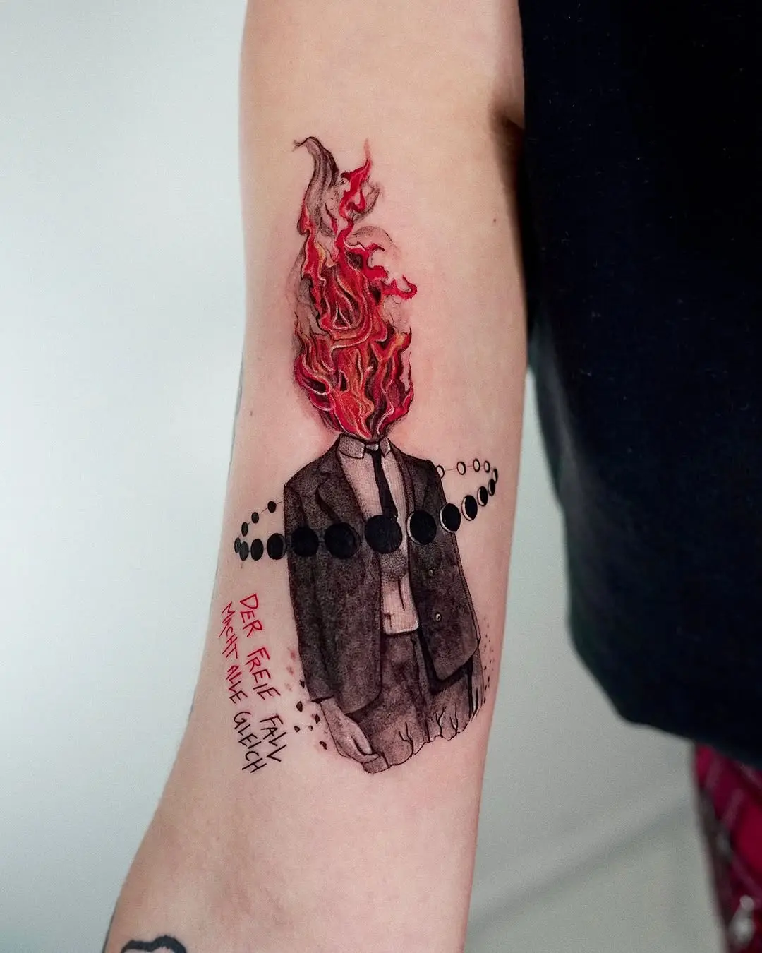 Creative fire-themed tattoo with striking colors