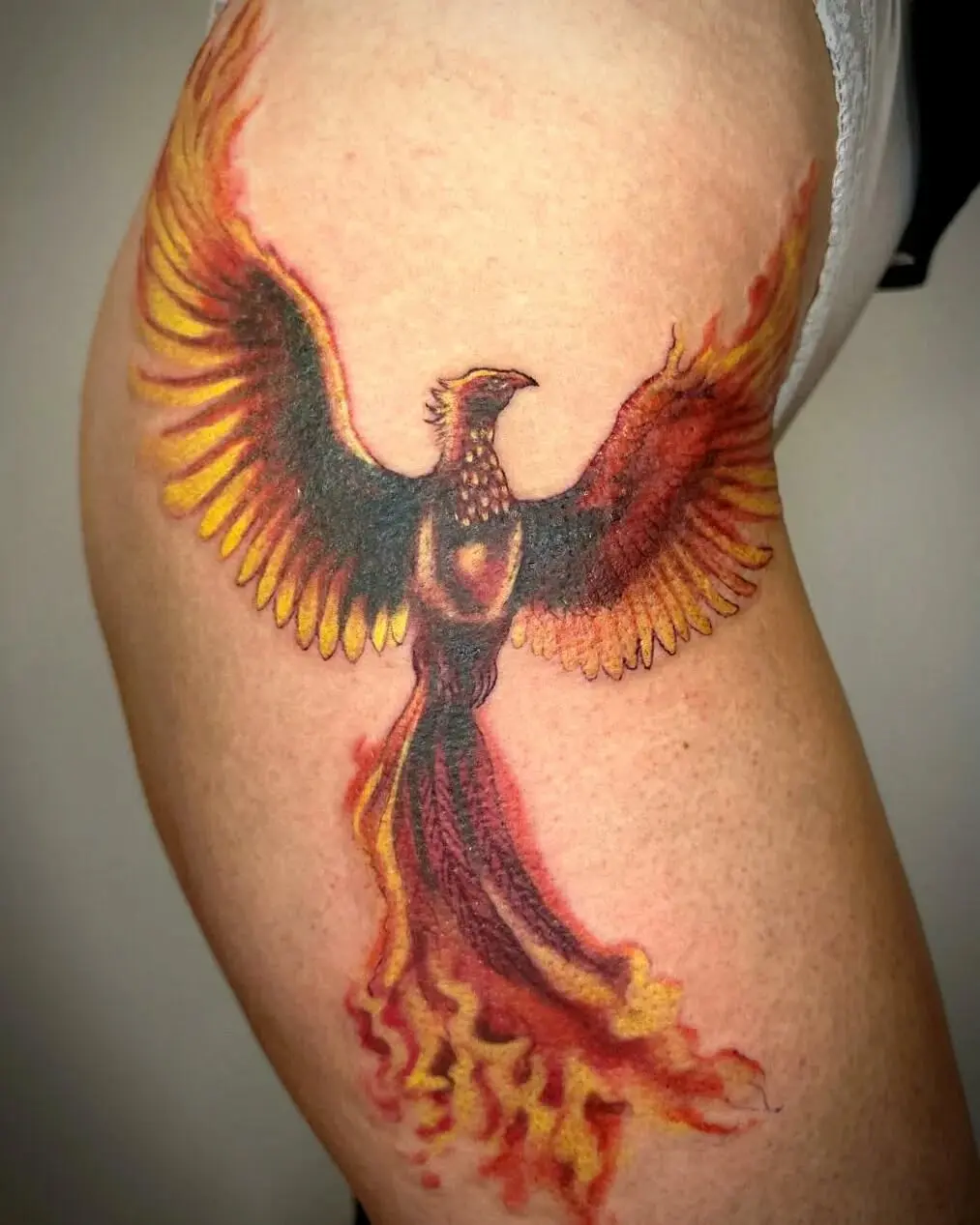Colorful Phoenix Tattoo Symbolizing Rebirth