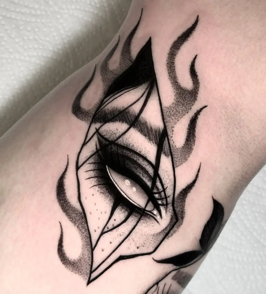 Sleek eye art enveloped by flames