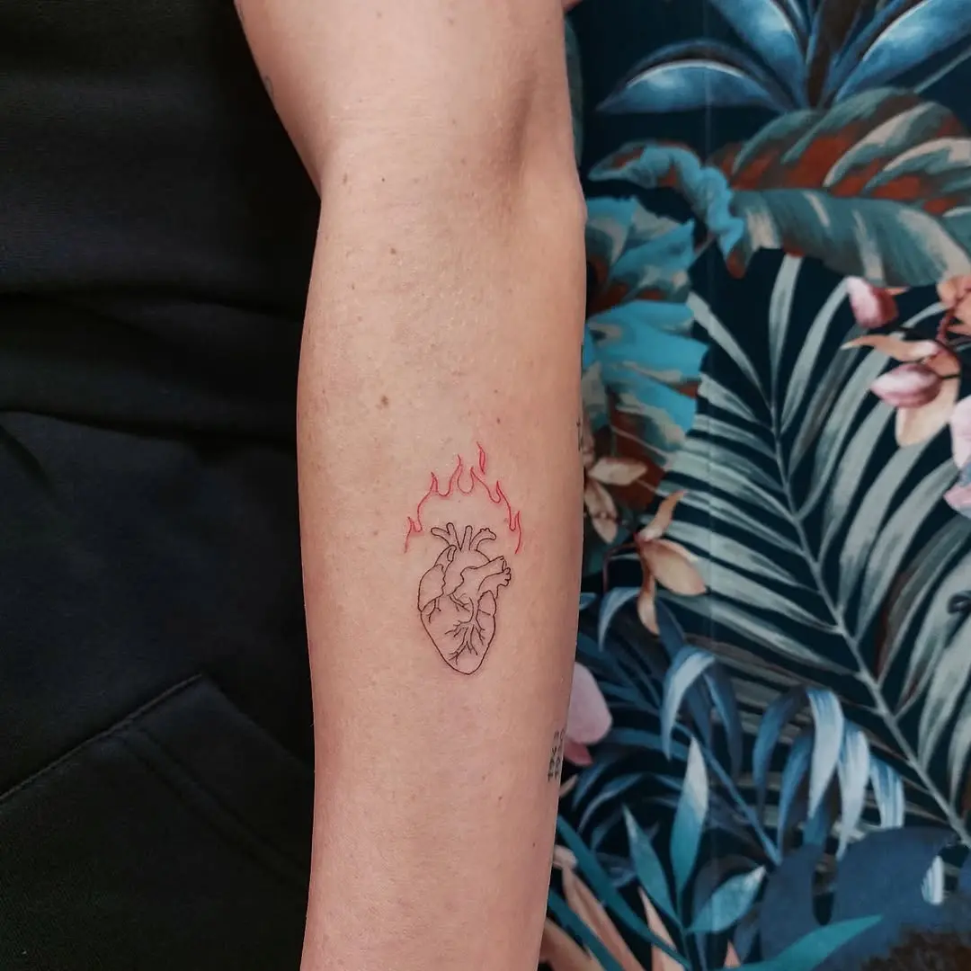 Heart Tattoo with Fiery Accents