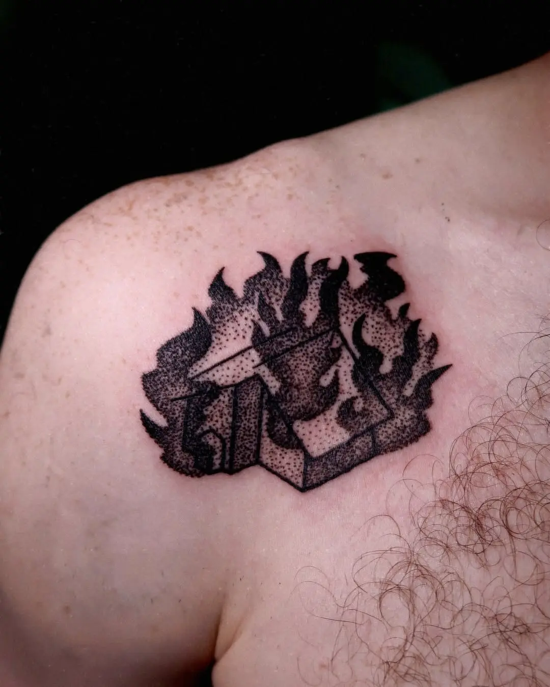 Fiery house tattoo showcasing burning intensity
