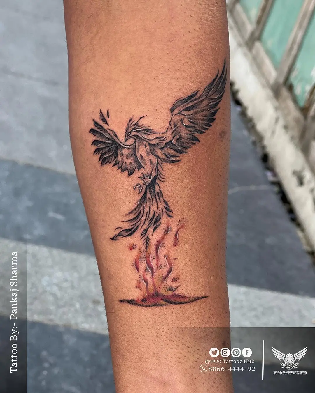 Vibrant phoenix rising from fiery embers