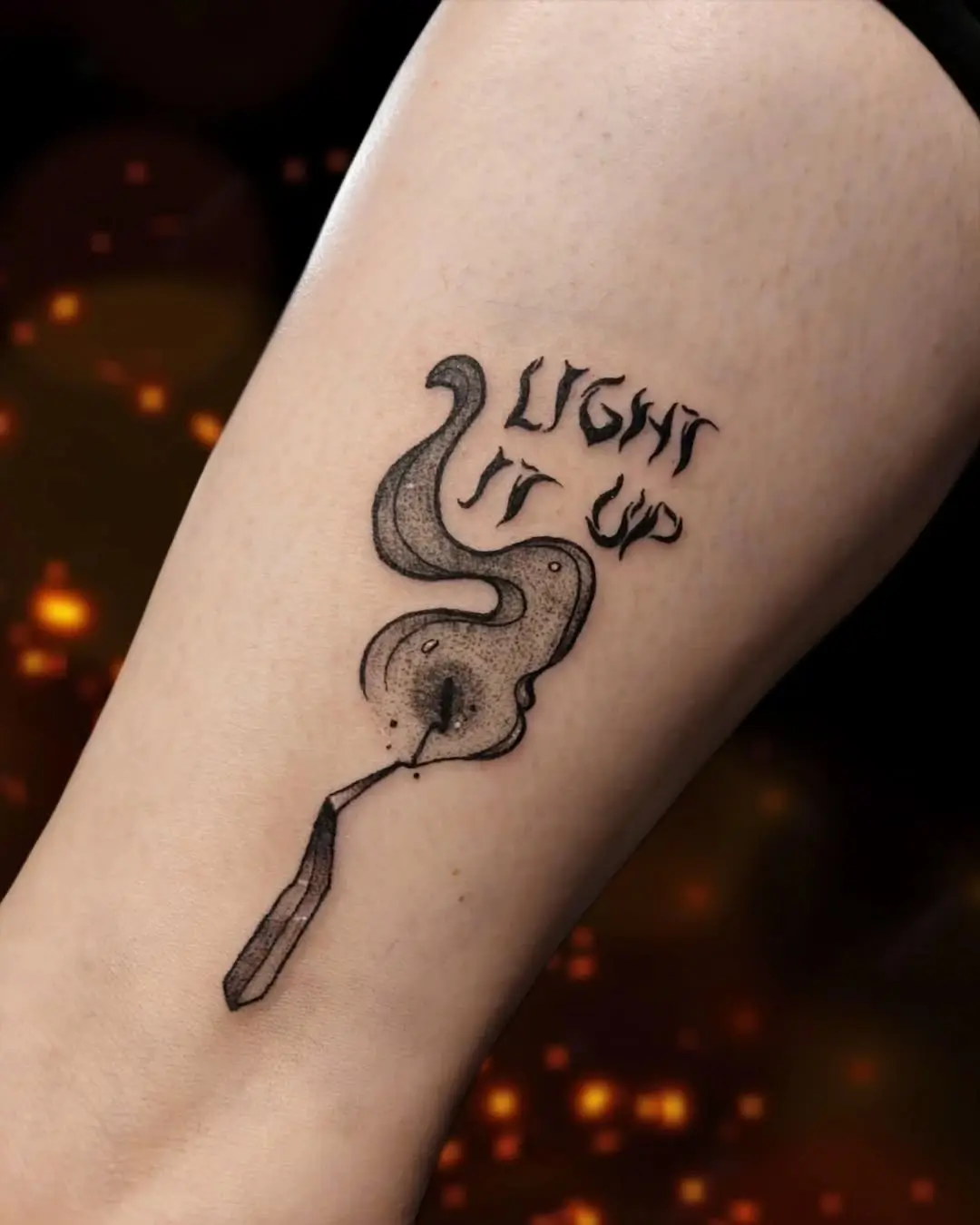 Intricate fire-themed tattoo with smoky vibe