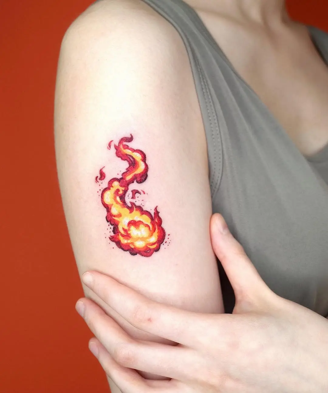 Vivid fire tattoo showcasing swirling flames