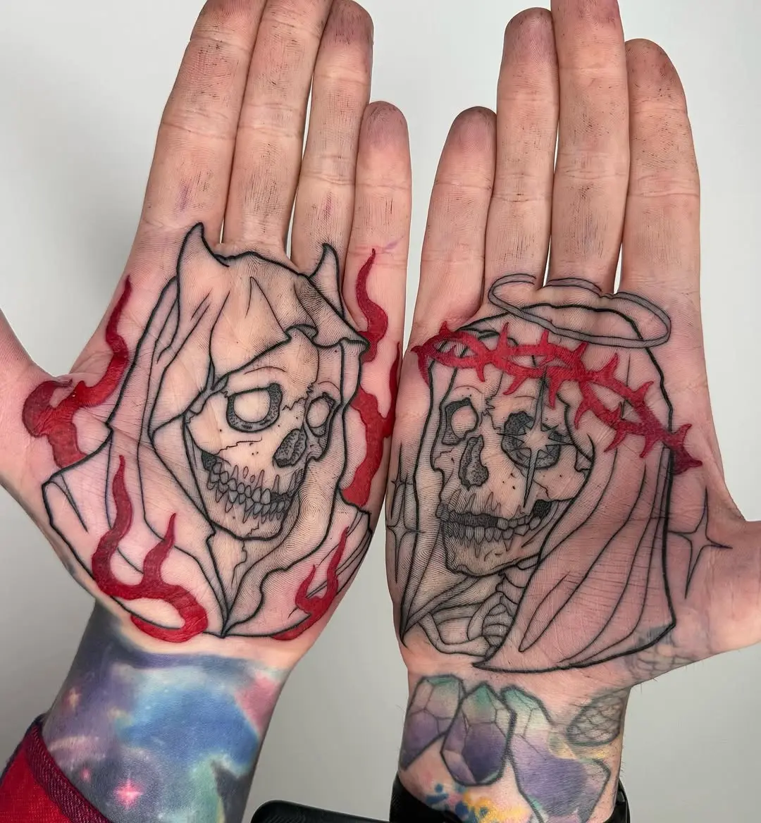 Striking fire-themed skull hand tattoos