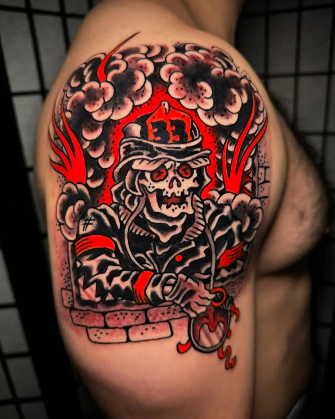 Bold firefighter skull tattoo with vibrant flames