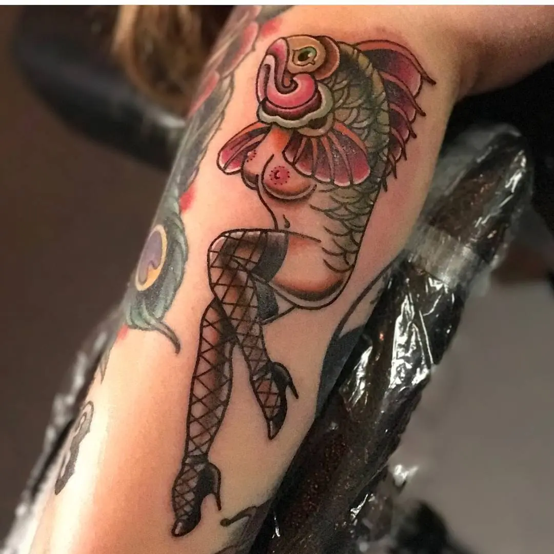 Unique Fish-Inspired Mermaid Tattoo Artwork