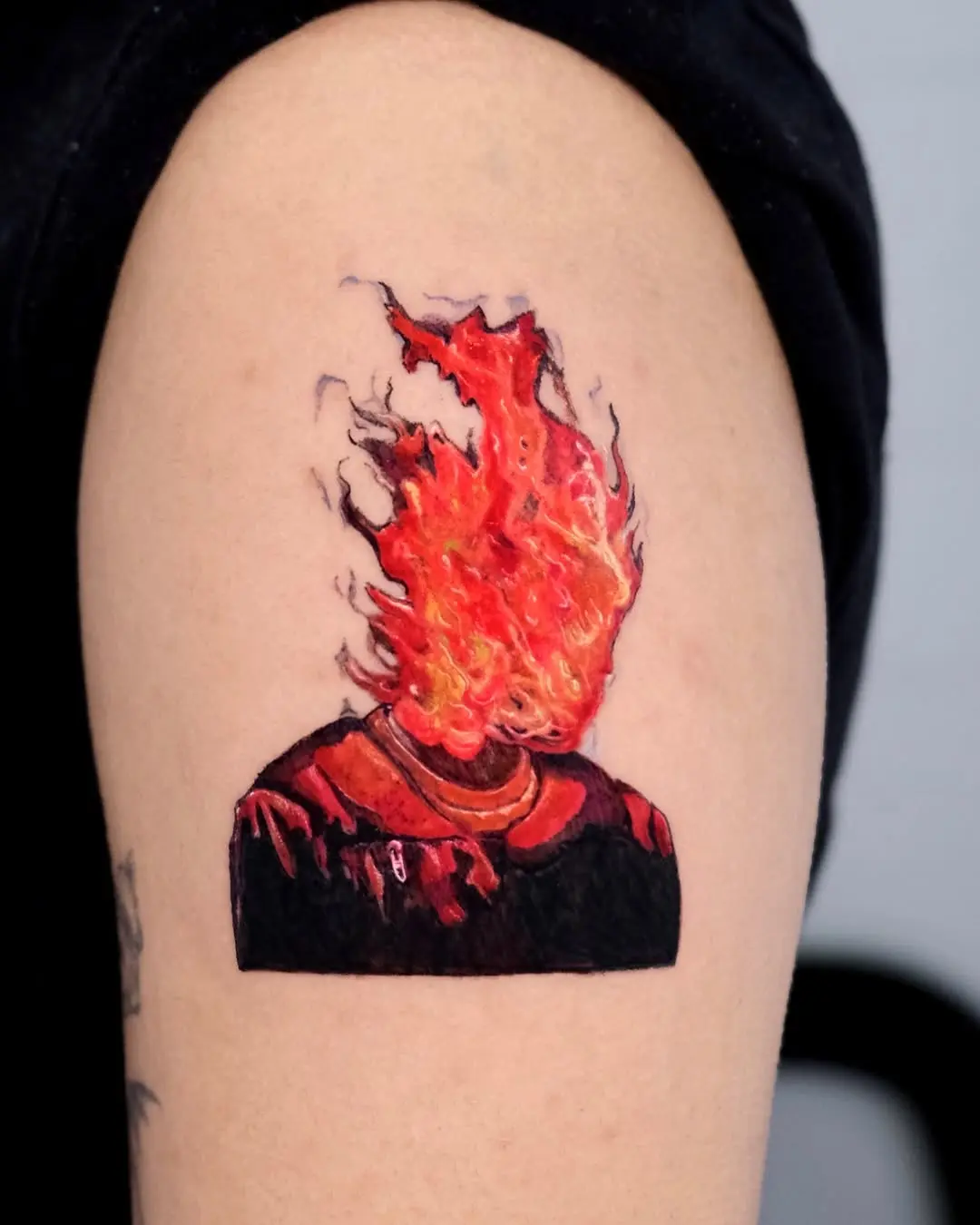 Stunning flaming head tattoo design