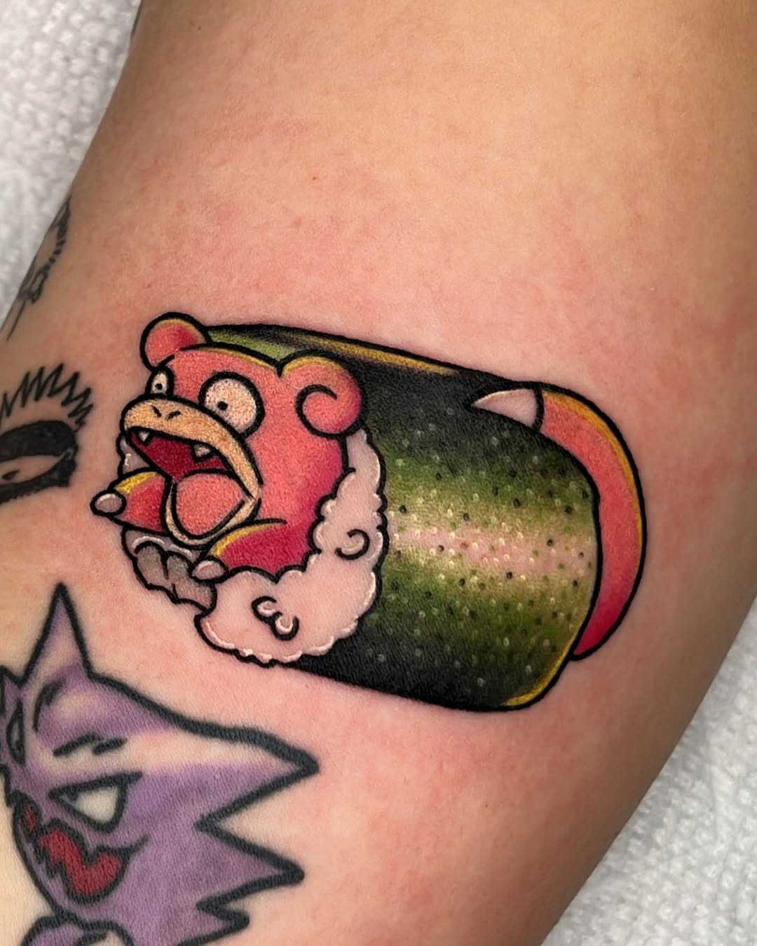 Playful sushi tattoo with vibrant colors