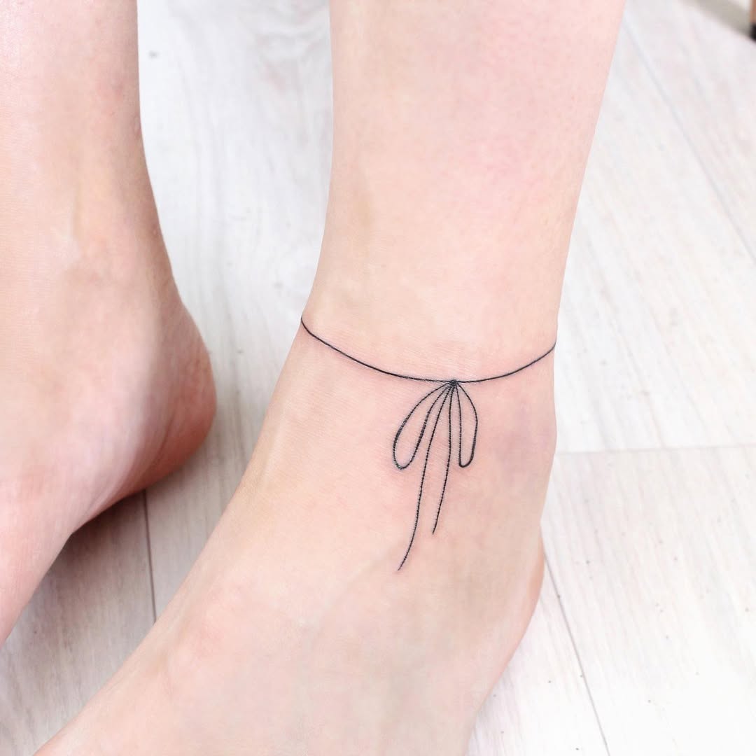 Elegant minimalist foot tattoo for a delicate look