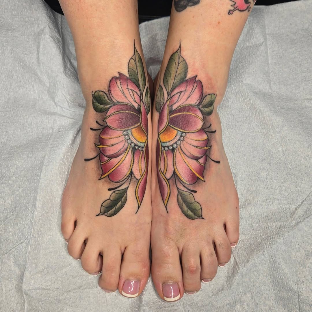 Vibrant Floral Butterfly Foot Tattoo Design