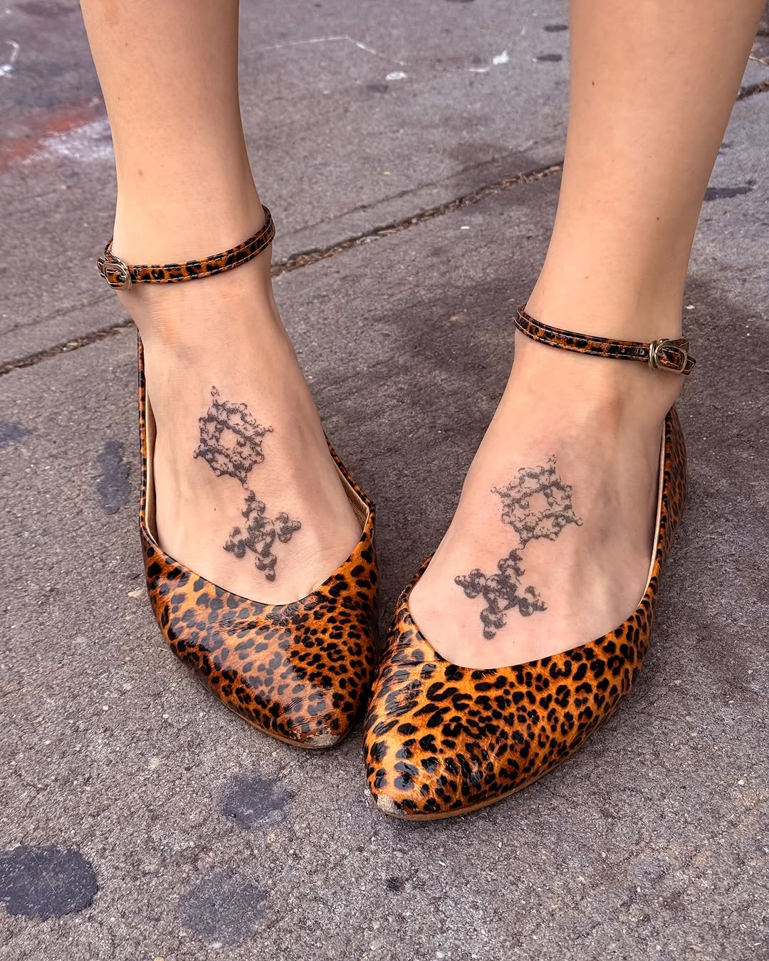 Stylish Foot Tattoos Complementing Animal Print Heels