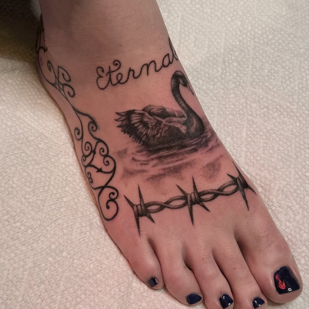 Elegant Swan Foot Tattoo with Meaningful Message