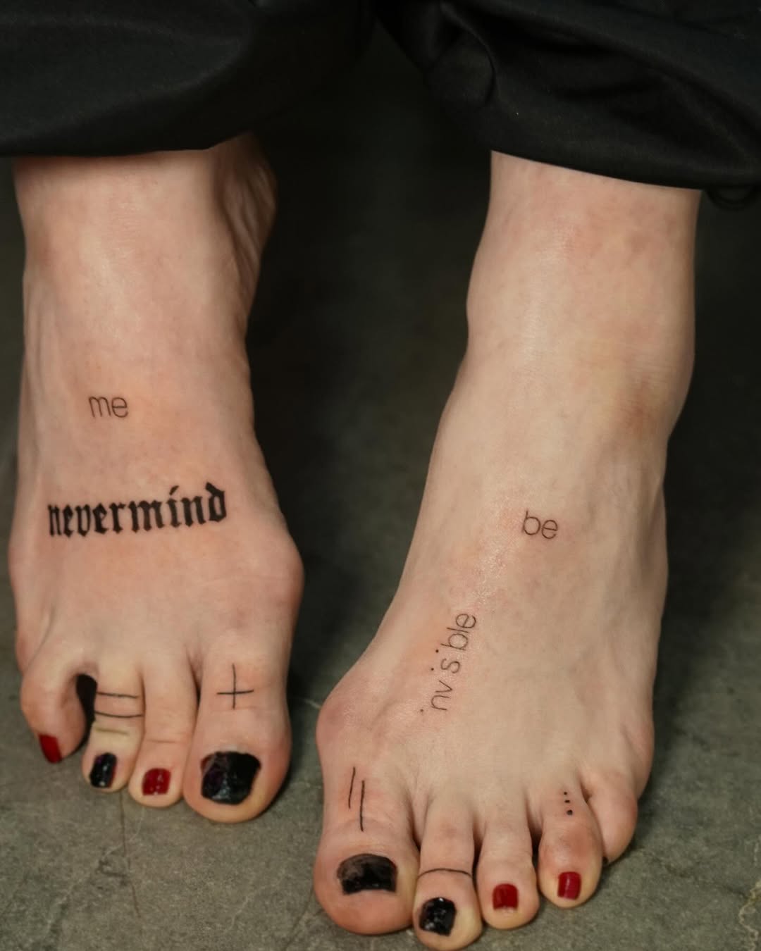 Artistic foot tattoos with bold lettering