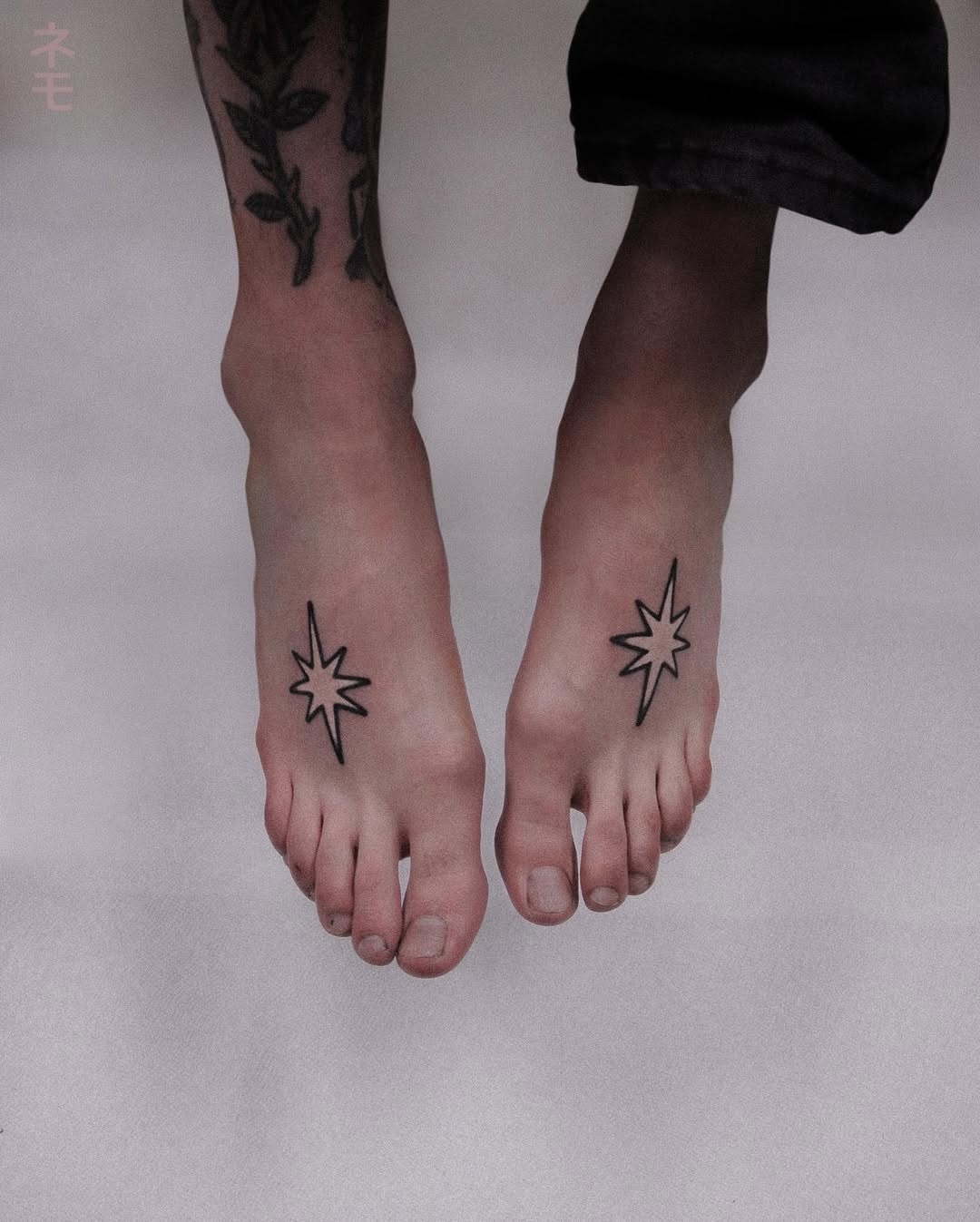 Minimalist Star Tattoos on Bare Feet