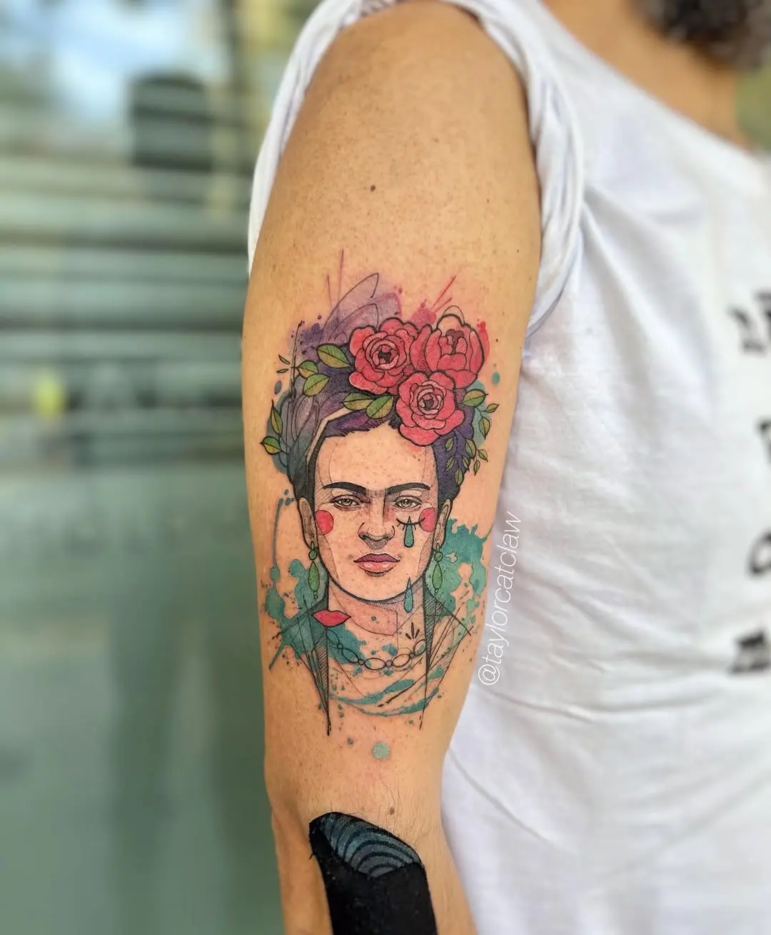 Colorful Frida Kahlo Tattoo Featuring Flowers
