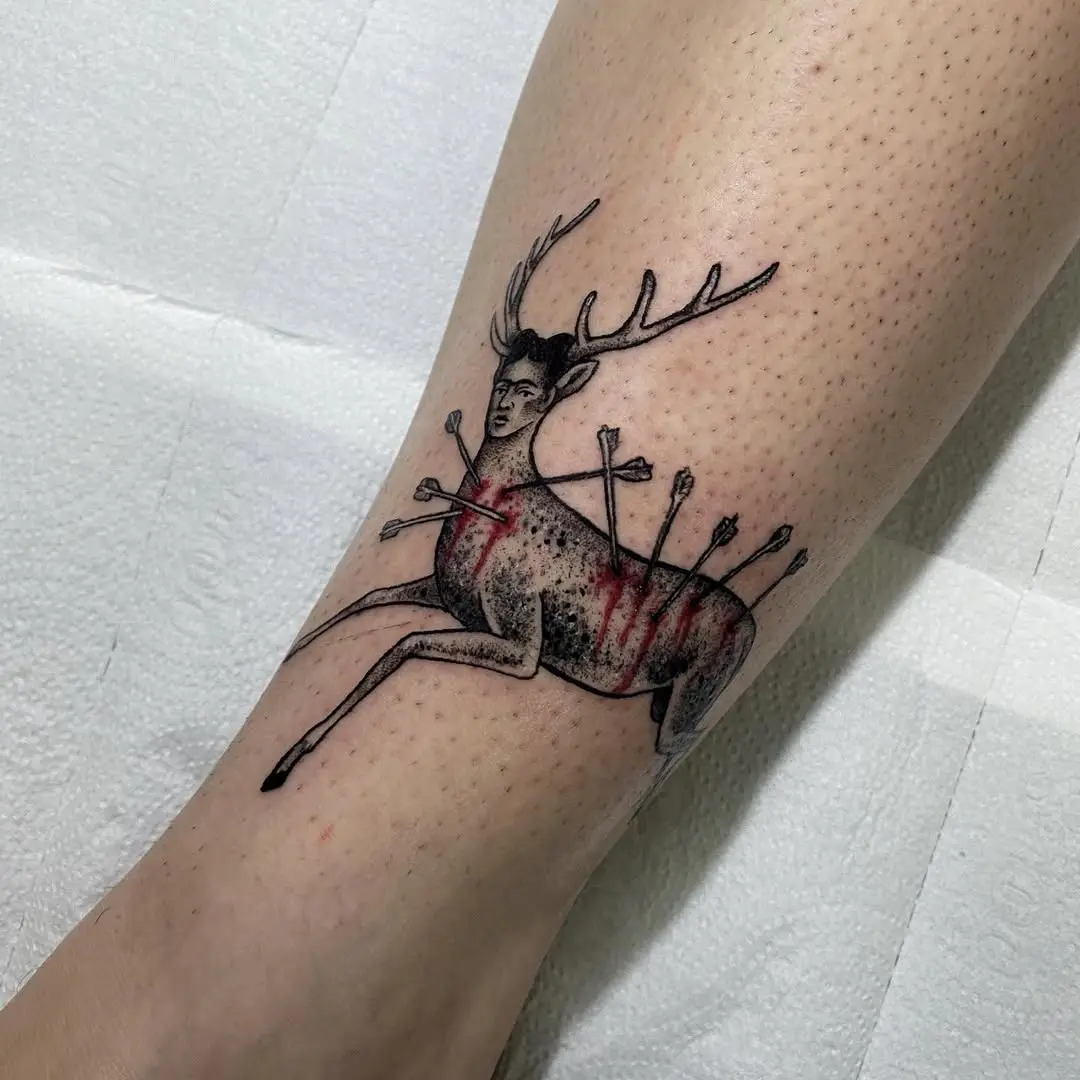 Symbolic Frida-inspired tattoo merging nature and pain
