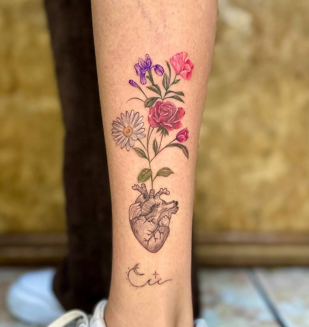 Stunning tattoo merging heart and flowers