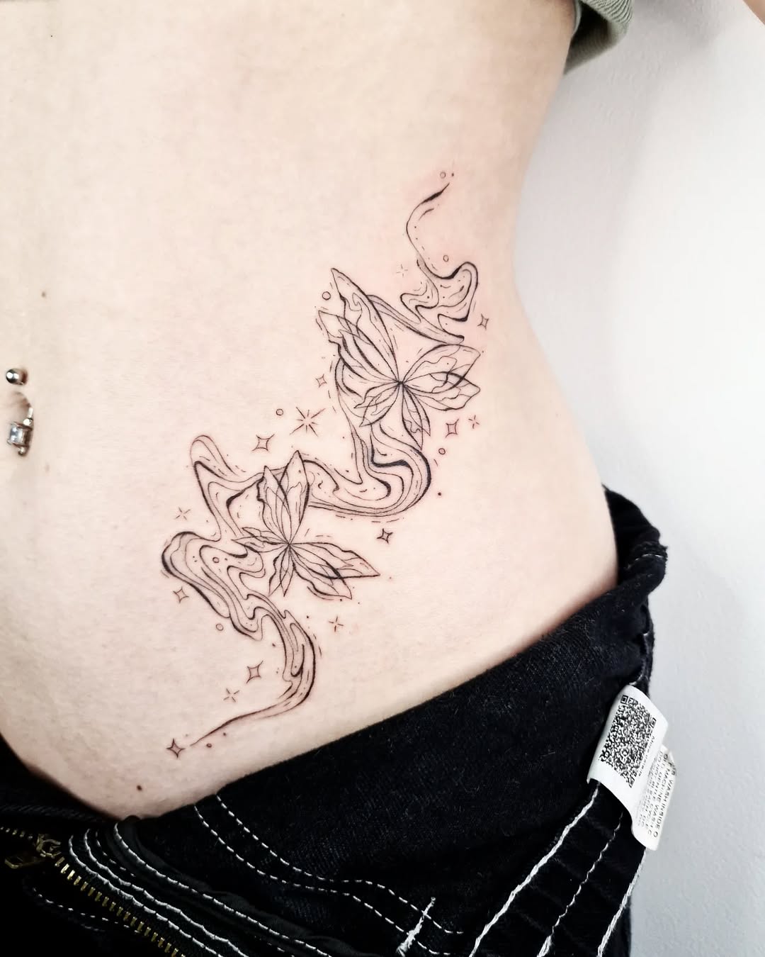 Whimsical butterfly and floral hip tattoo design