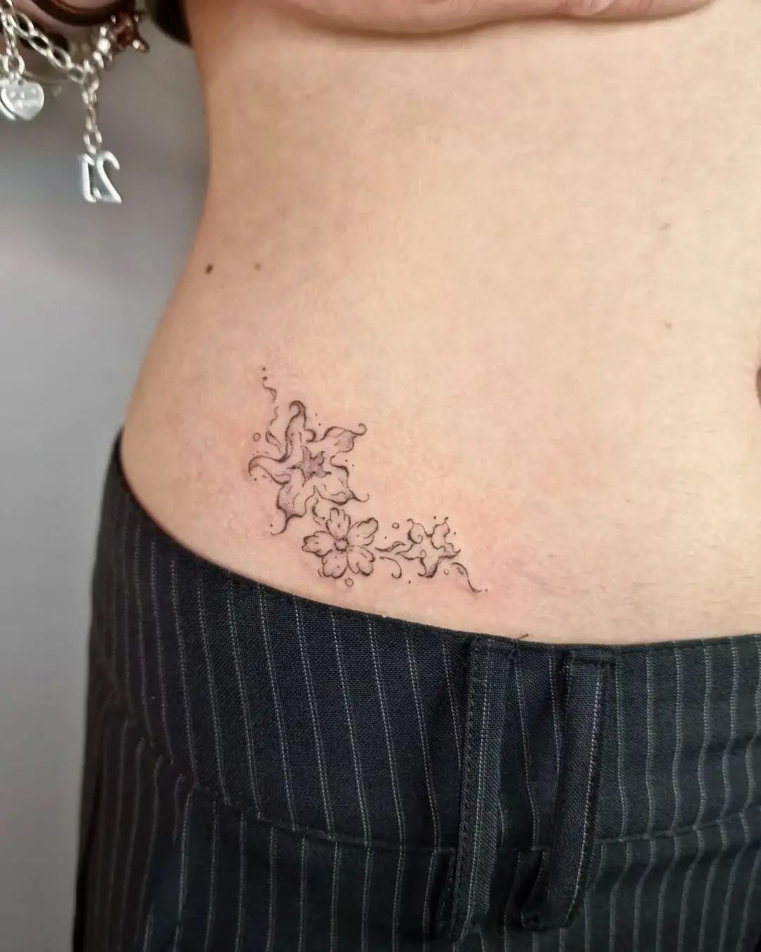 Delicate Floral Design on Hip